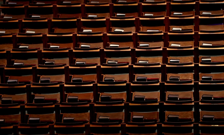 Image: Empty seats during Sunday Mass at the Washington National Cathedral on March 22, 2020.