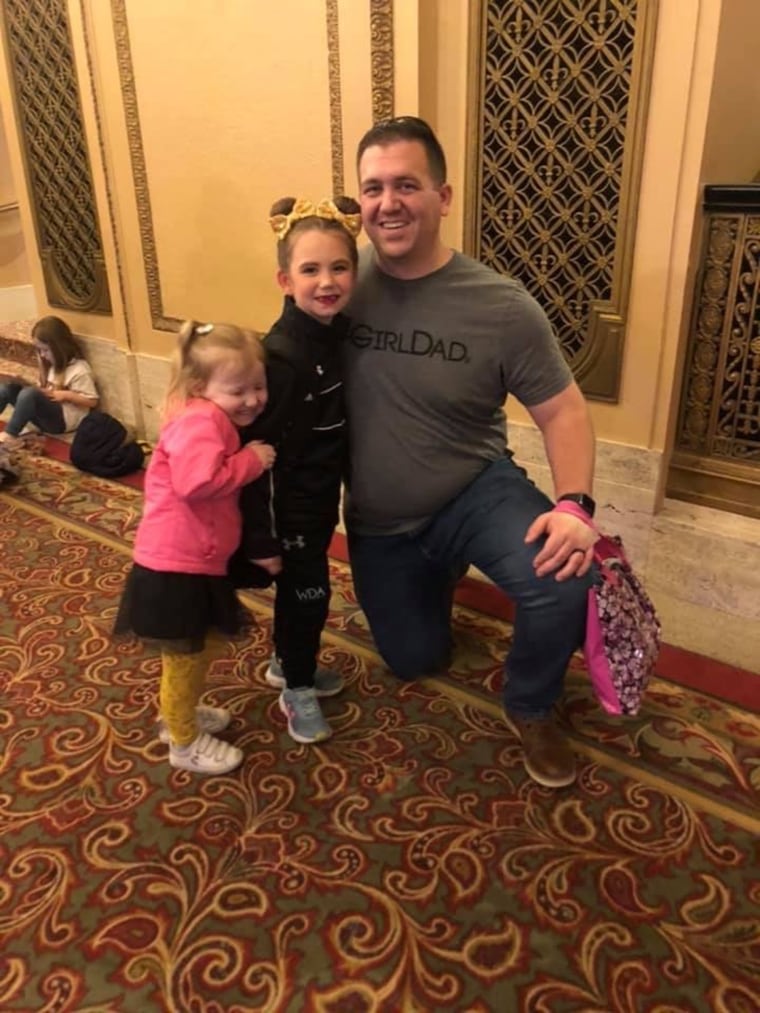 Lt. Tyler Kroenke with his daughters, Miela and Everly.