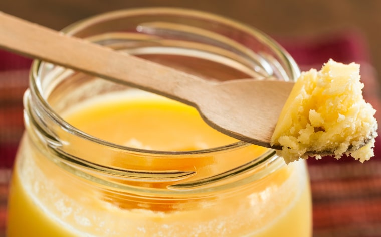 Close-Up Of Ghee In Jar