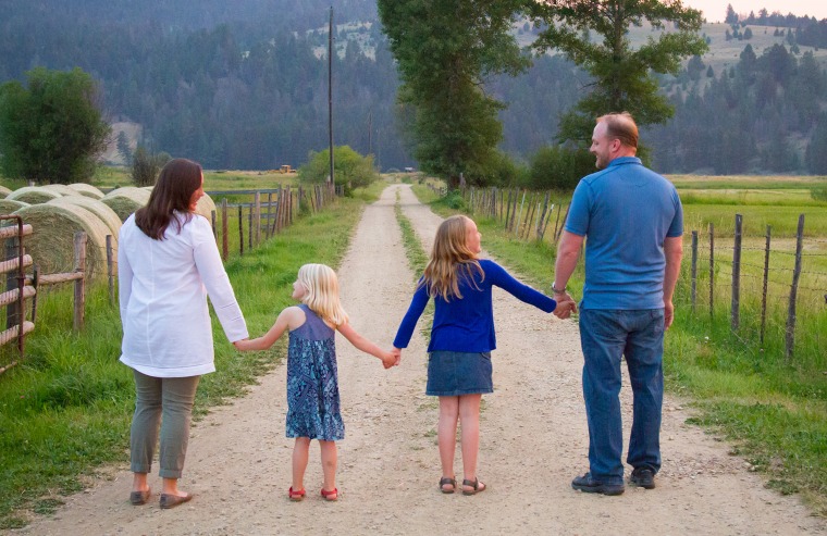 Police Sgt. Julie Beard works in a suburb of Seattle and her husband, Jess, is a grocery store manager. They have been relying on the YMCA’s emergency child care for their young daughters, Katie and Lily.