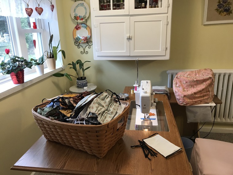 A basket of completed homemade face masks in Sheri Yeisley's workspace.