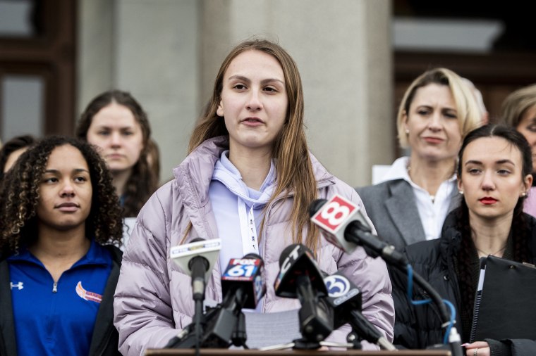 Image: From left, Alanna Smith, Danbury High School sophomore, Canton High School senior Chelsea Mitchel and Selina Soule, Glastonbury High School senior, speak during a press conference at the Connecticut State Capitol