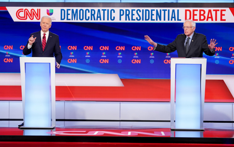 Joe Biden and Bernie Sanders during a debate in Washington on March 15, 2020.