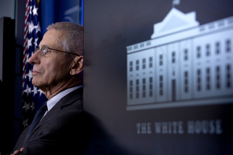 Image; Anthony Fauci, director of the National Institute of Allergy and Infectious Diseases, listens during a Coronavirus Task Force news conference at the White House on March 21, 2020.