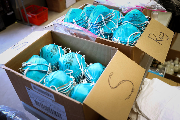 Image: Boxes of N95 protective masks for use by medical field personnel are seen at a New York State emergency operations incident command center during the coronavirus outbreak in New Rochelle