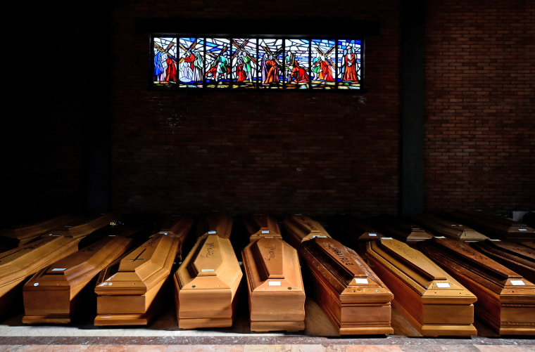 Coffins of people who have died from coronavirus disease (COVID-19) are seen in the church of the Serravalle Scrivia cemetery