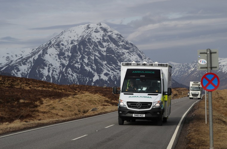 Image: An ambulance is driven on the A82, during the coronavirus disease (COVID-19) outbreak, near Buachaille Etive Mor, Scotland