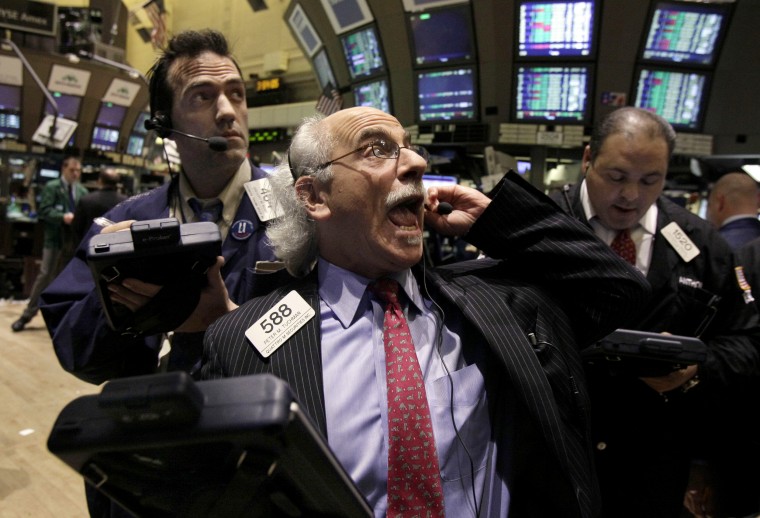 Image: Trader Peter Tuchman works the floor of the New York Stock Exchange in 2012.
