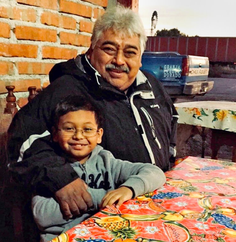 Roman Vasquez, pictured here with his 11-year-old grandson Jacob, is being held in an ICE detention center in Conroe, Texas.