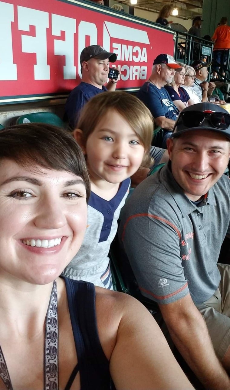 Emergency room nurse Devon Oechsle and her husband Jason, a firefighter and medic, and their daughter Eliana, 3, in happier times. 