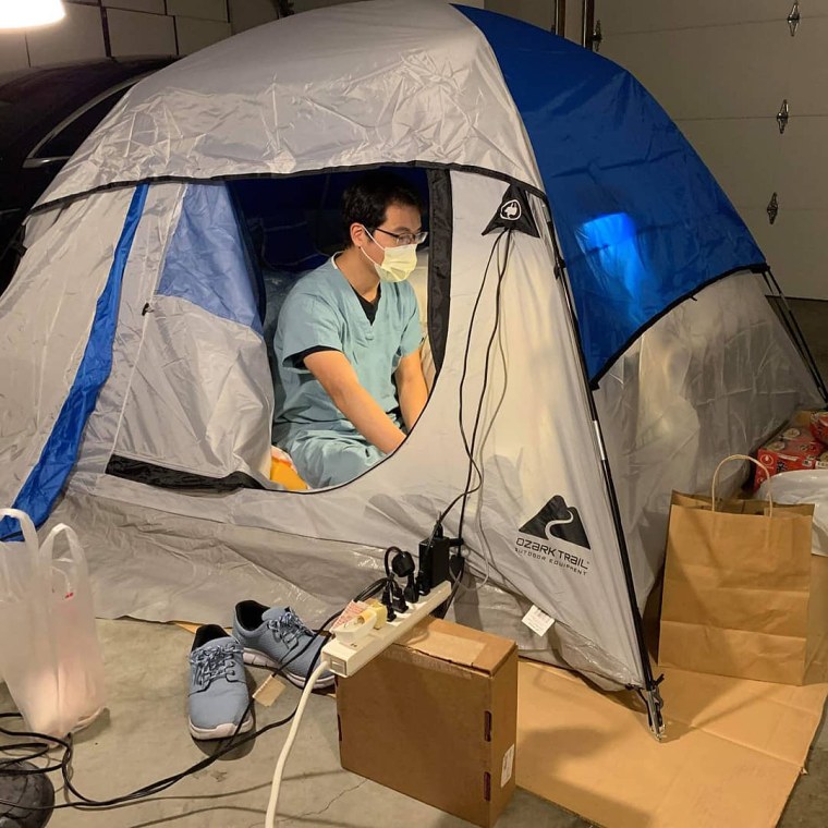 Dr. Tim Cheng's shared this photo of his current home on Instagram; a tent with a twin bed that he set up in his garage in order to self-isolate from his family.