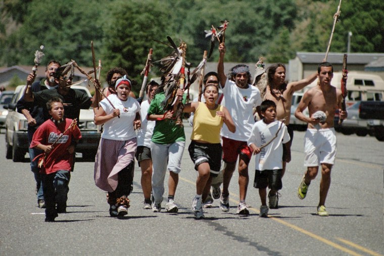 Author Noe Alvarez, left, runs with Peace and Dignity Journeys from Canada to Guatemala.