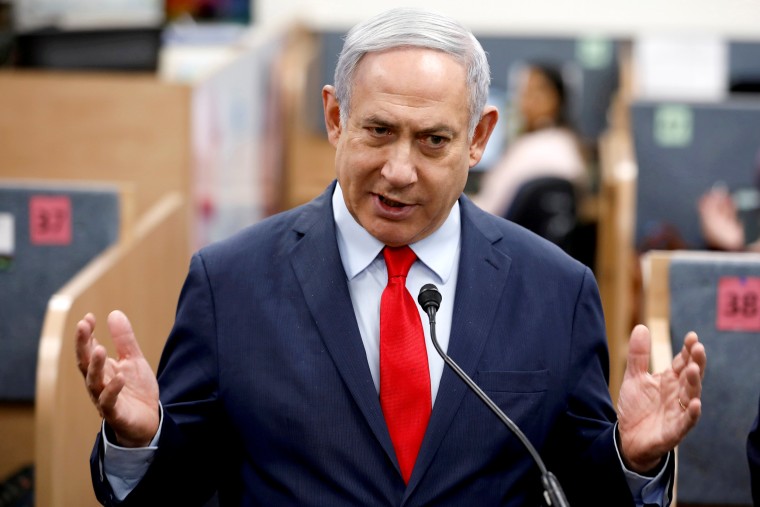 Image: FILE PHOTO: Israeli Prime Minister Benjamin Netanyahu gestures as he delivers a statement during his visit at the Health Ministry national hotline, in Kiryat Malachi, Israel