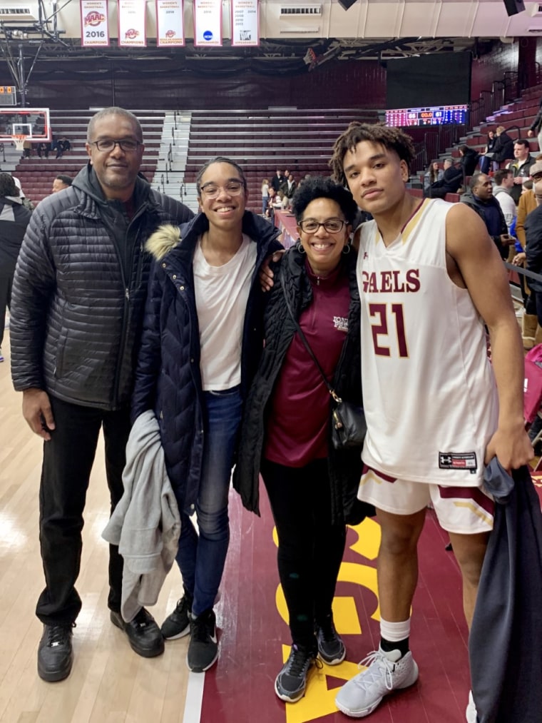 CNBC senior personal finance correspondent Sharon Epperson with her husband Christopher Farley and daughter Emma Farley at her son Dylan Farley's basketball game in early February.