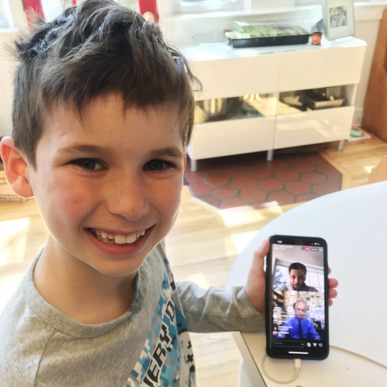 Gideon, the son of Maeve Kennedy McKean, as he watched Stephen Curry and Dr. Fauci on March 26, 2020.