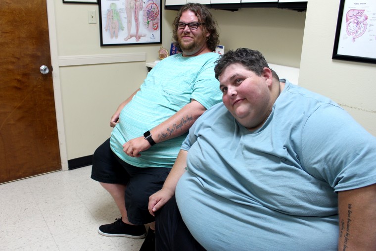 Lonnie and John at a doctor consult during the Season 8 episode of \"My 600-lb Life\" on TLC.