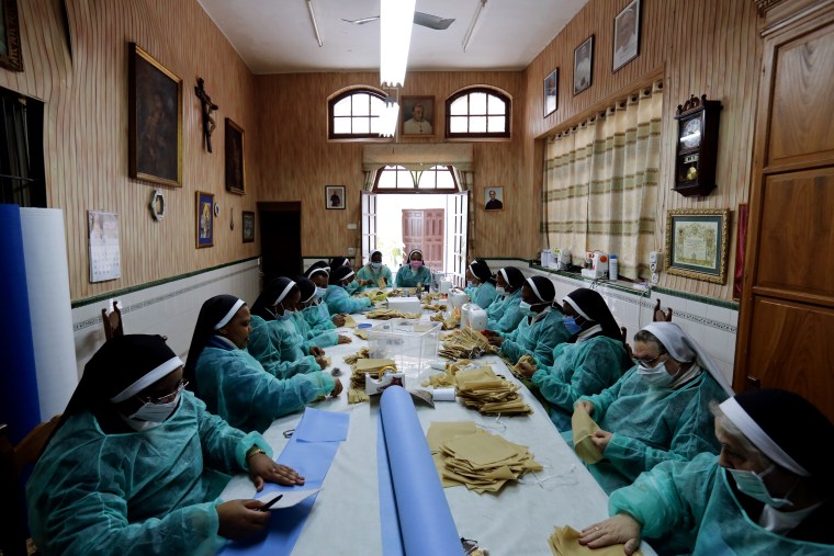 Image: Augustinian nuns make face masks at the San Leandro convent in Seville, Spain, on April 4, 2020.