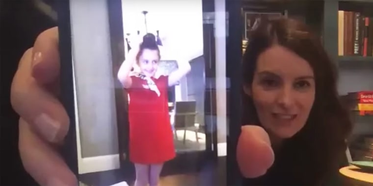 Tina Fey shared a sweet video of her youngest daughter, Penelope, playing the part of a flight attendant for an airplane-themed dinner night.
