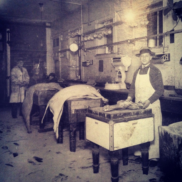 Jack Salett, Seymour and Bobby's father, inside their shop.