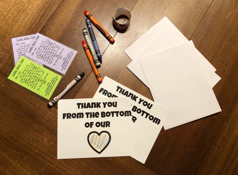 Liz Bortnyik and her children are writing thank you notes to essential workers to stay busy. They love seeing pictures of people who have received their notes and prayer cards. 