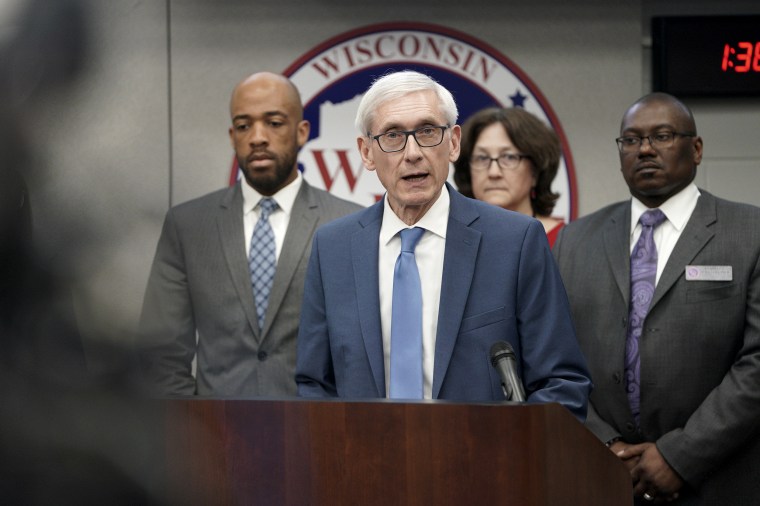 Gov. Tony Evers declares a public health emergency in response to a growing number of cases of COVID-19, in Madison, Wis., on March 12, 2020.