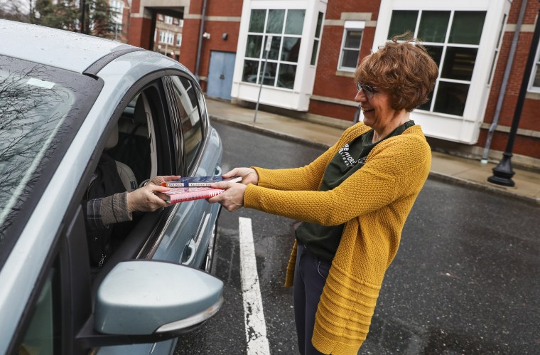 Image: Natick Library Hand-Delivers Books as it Closes to Stop Spread of Corona