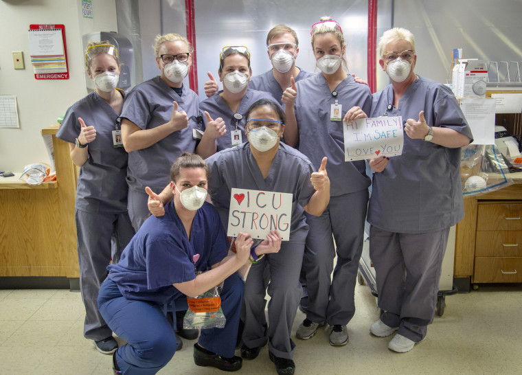 ICU nurse Arlene Van Dyk with her colleagues at Holy Name Medical Center in Teaneck, N. J.,