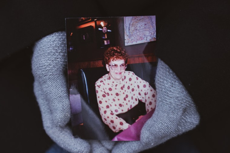 Deborah Mastromano holds a photo of her mother, Betty Coleman.