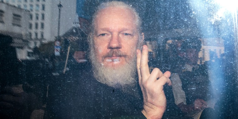 Julian Assange arrives at Westminster Magistrates Court in London on April 11, 2019.