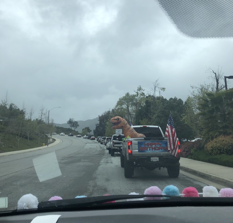 The cars that participated in the parade were each decorated with colorful signs that contained words of encouragement.