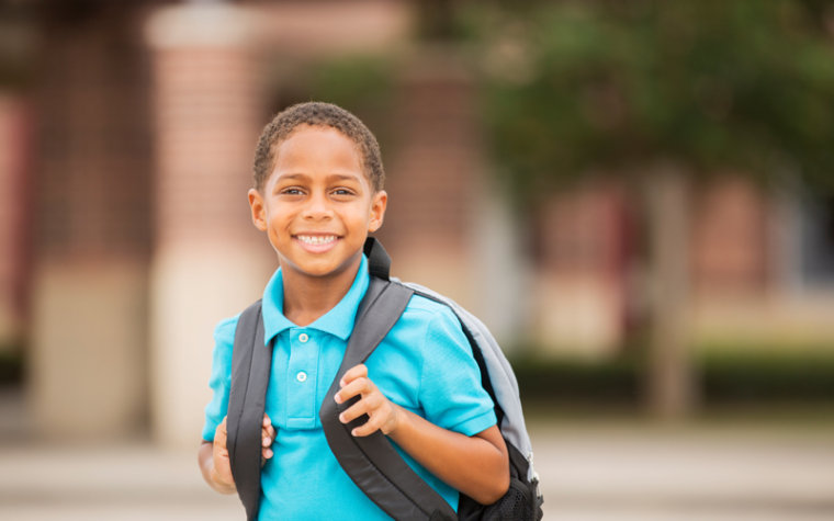 Young boy with a backpack