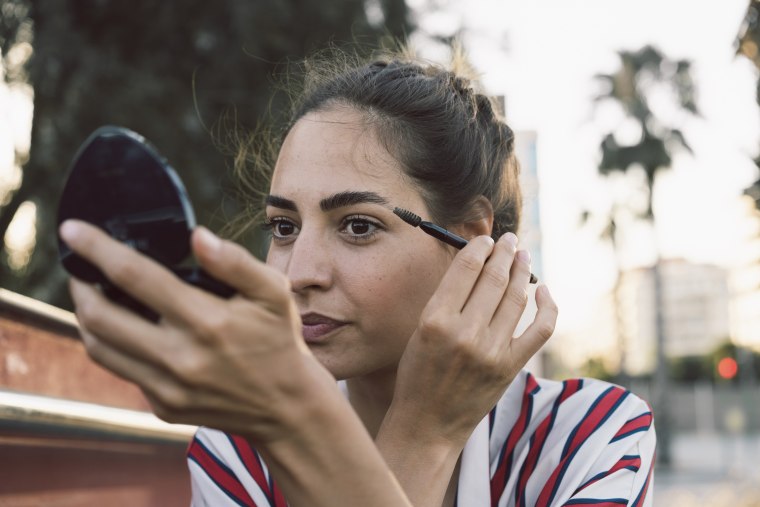 Use mascara and eyeshadow to temporarily tint gray hairs. 