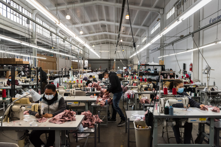 Hedley &amp; Bennet employees hard at work on the factory floor.