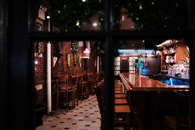 Image: An empty bar in Brooklyn after New York City ordered bars and restaurants to close to slow the spread of coronavirus on March 16, 2020.
