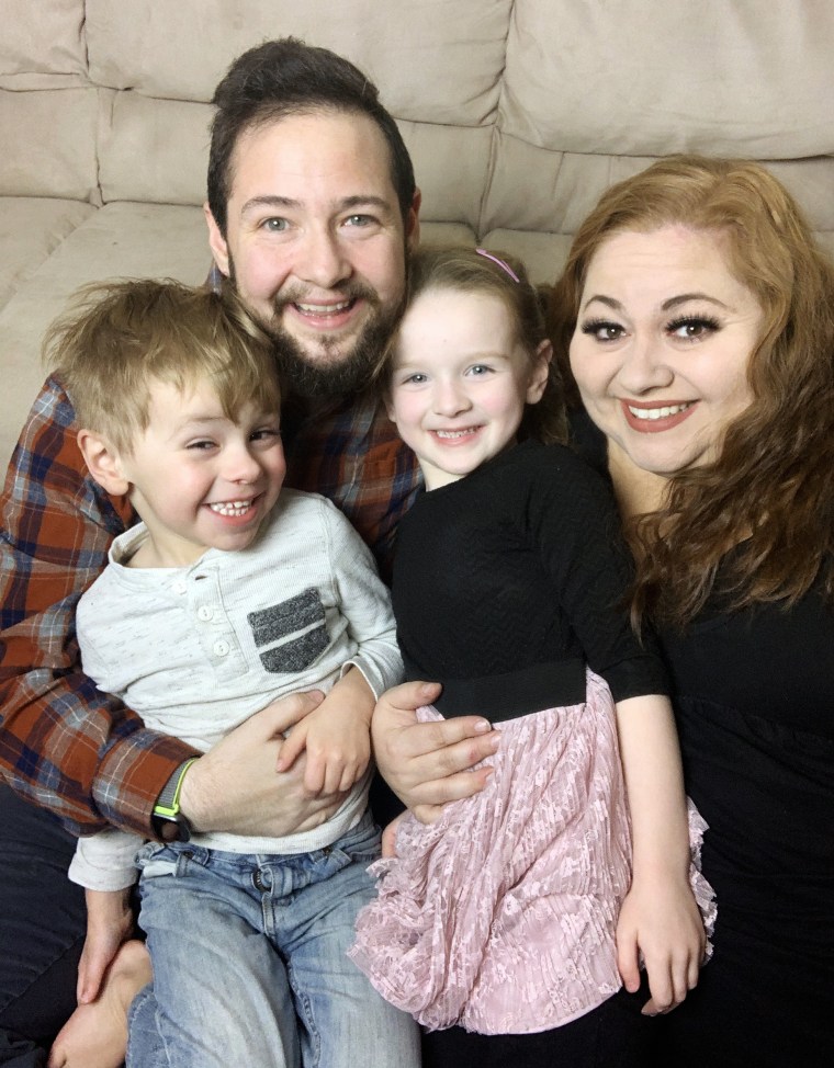 Chris Rehs-Dupin, his wife and their two children.