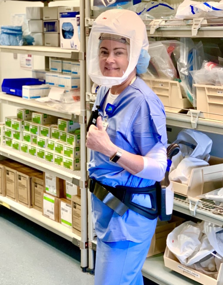 Registered nurse in the ICU Cindy Erickson suited up at Glenbrook Hospital in Glenview, Illinois.