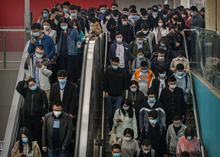 Image: Commuters in Beijing