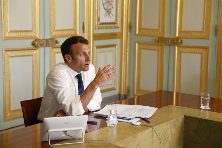 Image: French President Emmanuel Macron, attends a video conference call at the Elysee Palace in Paris,