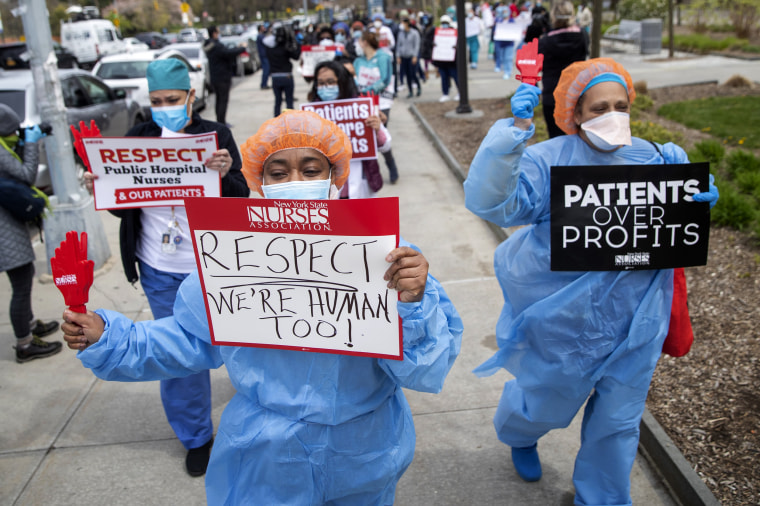 Image: Nurses protest a new sick leave policy requiring a doctor's note outside of Jacobi Medical Center in the Bronx, N.Y., on April 17, 2020.