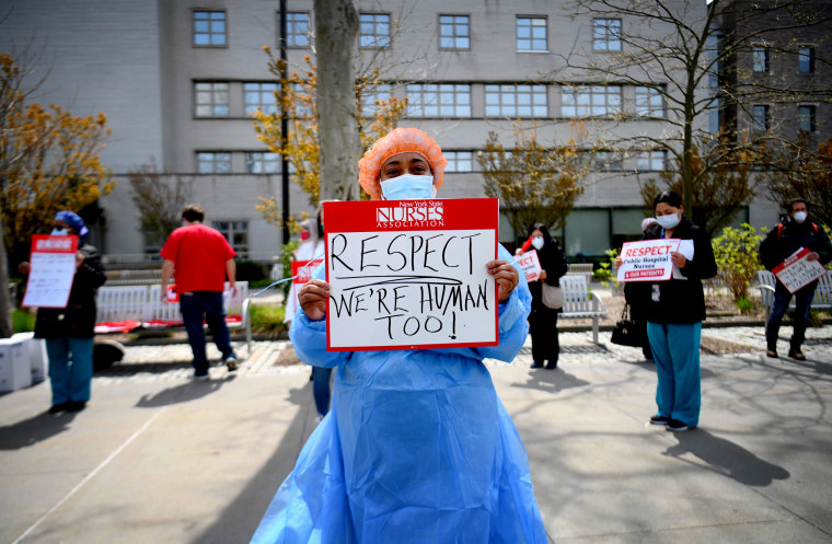 Image: Nurses and health care workers protest outside of Jacboi Medical Center in the Bronx, N.Y., on April 17, 2020.