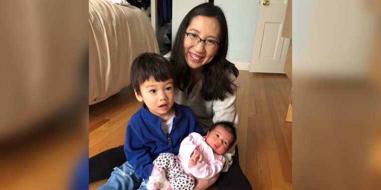 Dr. Leana Wen with her newborn daughter, Isabelle, and older son Eli.
