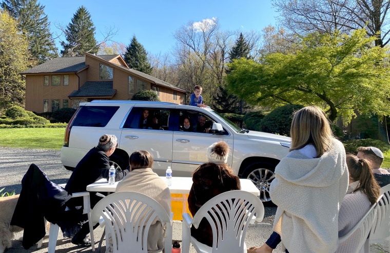 The Satnick family hosts a drive by shiva outside their home in Demarest, N.J.