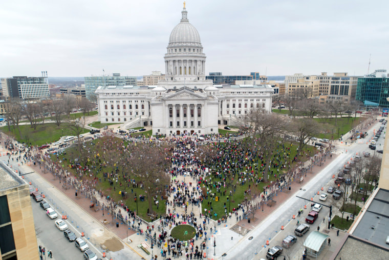 Image: Protesters against the state's extended stay-at-home order demonstrate in Madison