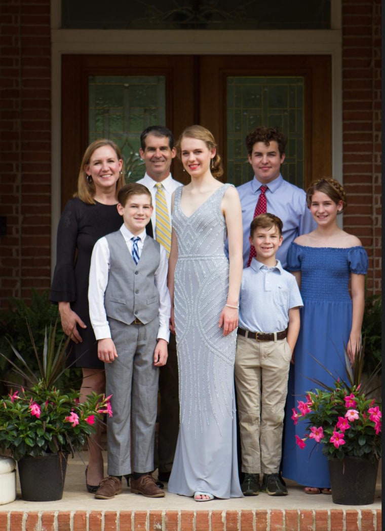 A local Tallahassee photographer, Lea Marshall, volunteered to take prom "porchtraits" of families hosting home proms for their Class of 2020 seniors, as the Roberts family did for their senior, Madeleine.
