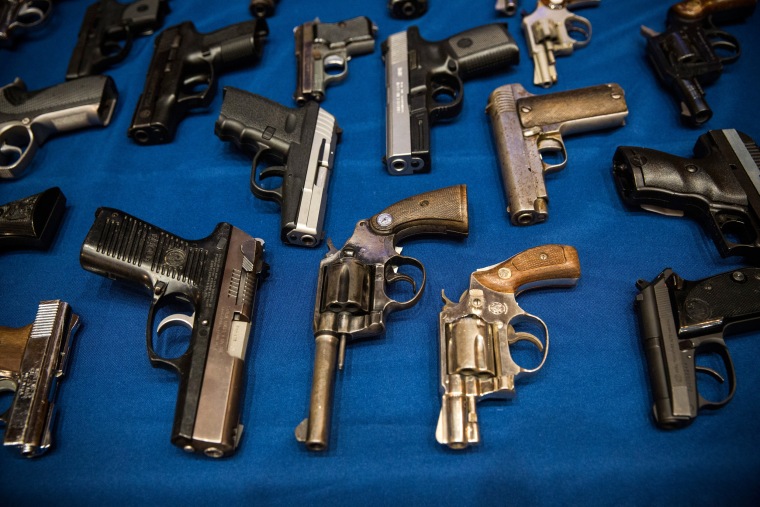 Image: Guns seized by the New York Police Department at a press conference on Aug. 19, 2013.