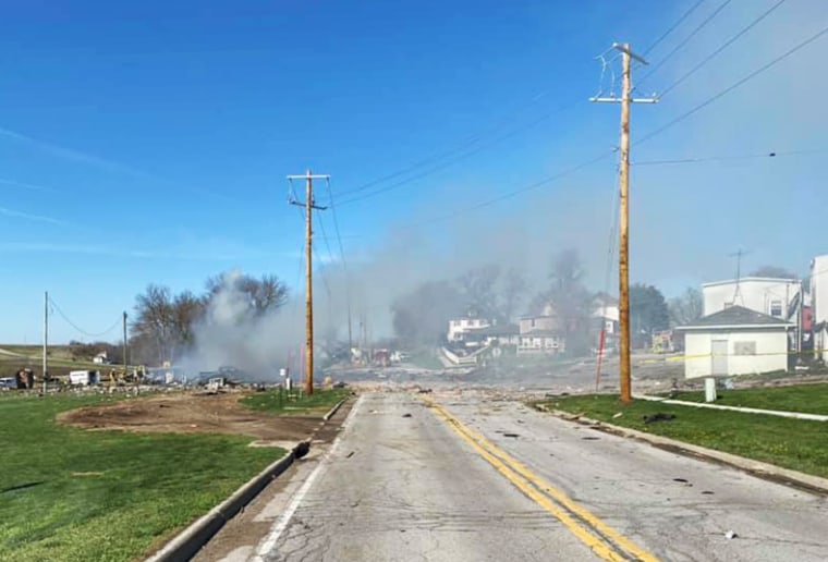 Smoke fills the air above a gas station in Earling, Iowa