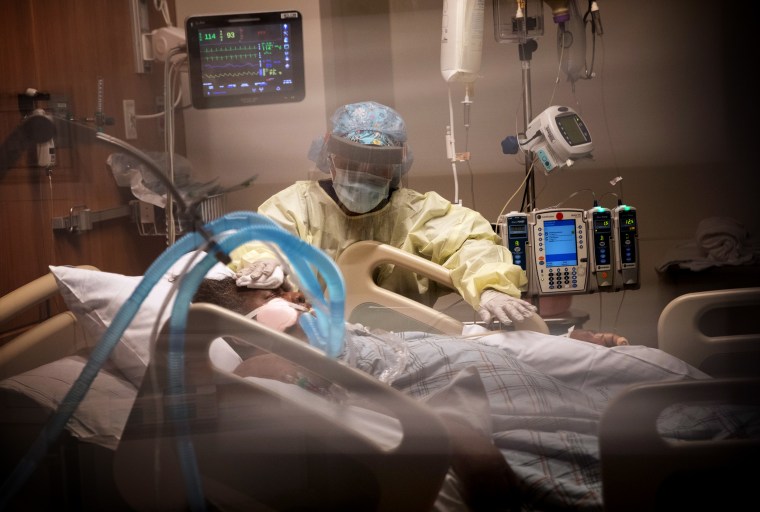 Image: A nurse attends to a COVID-19 patient at the Stamford Hospital ICU in Connecticut on April 24, 2020.