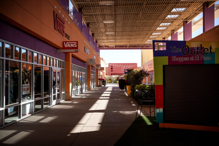 Image: Closed outlet stores in El Paso, Texas, after social distancing measures were put in place to curb the spread of coronavirus on March 21, 2020.