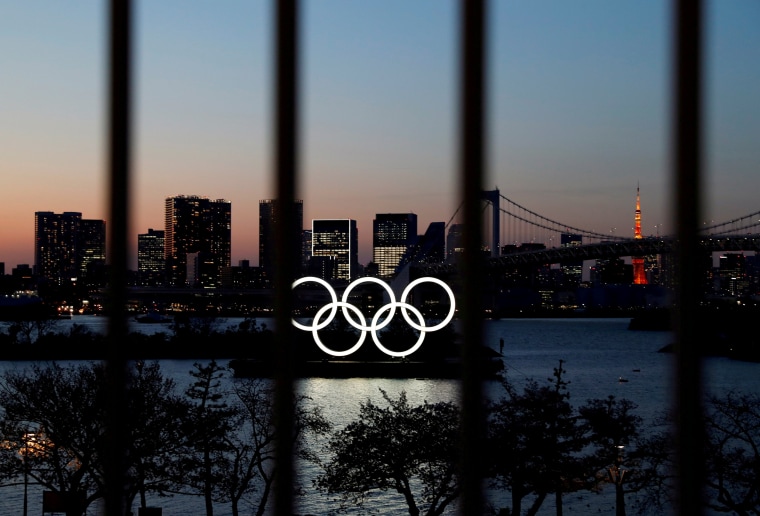 Image: The Olympic rings at the waterfront at Odaiba Marine Park in Tokyo in March.