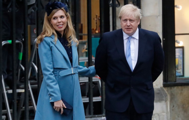 Image: Britain's Prime Minister Boris Johnson with his partner Carrie Symonds leave after attending the annual Commonwealth Service at Westminster Abbey in London.